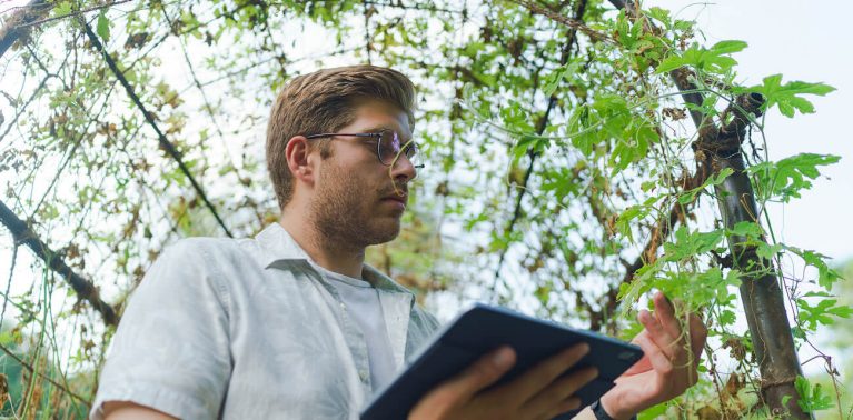 Employee talking on a mobile using mobile voice recording