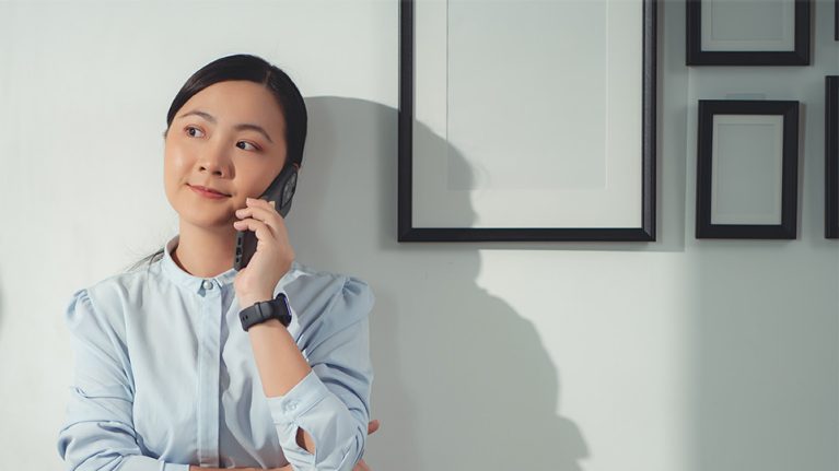 Woman using mobile phone