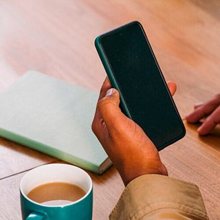 Woman holding mobile phone