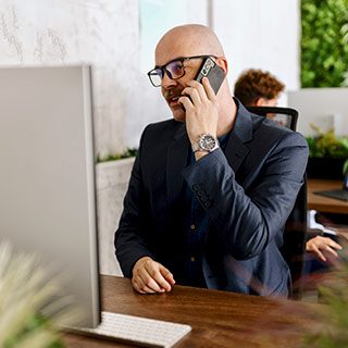 Man on mobile phone in office