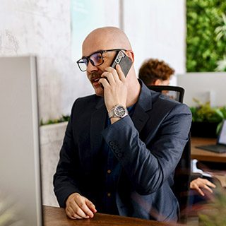 Man on mobile phone in office