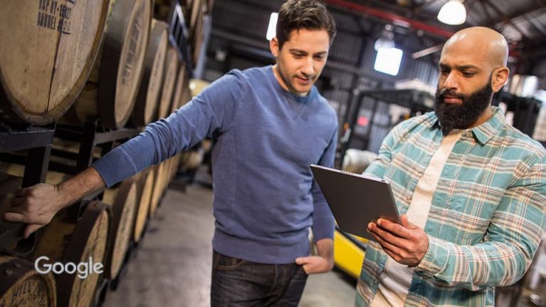 Man looking at tablet device