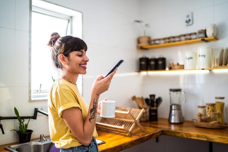 Woman on phone smiling