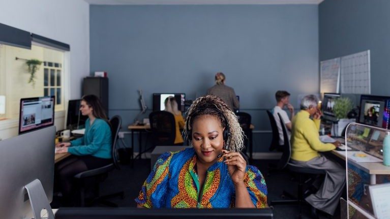 Lady on the phone in the office