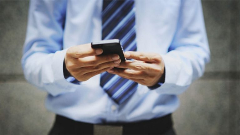 Man holding mobile phone